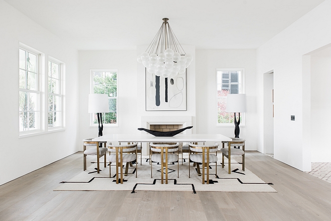 Modern Dining Room The room occupies both dining and entertaining areas - the ideal gathering space for a family that loves to host #ModernDiningRoom