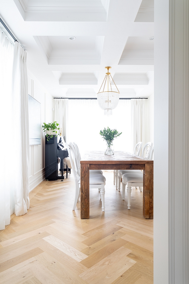 These herringbone floors were a last minute decision which turned out to be our favourite feature of this room We also added some millwork to give the white walls some interest #HerringboneHardwoodFlooring #herringboneflooring