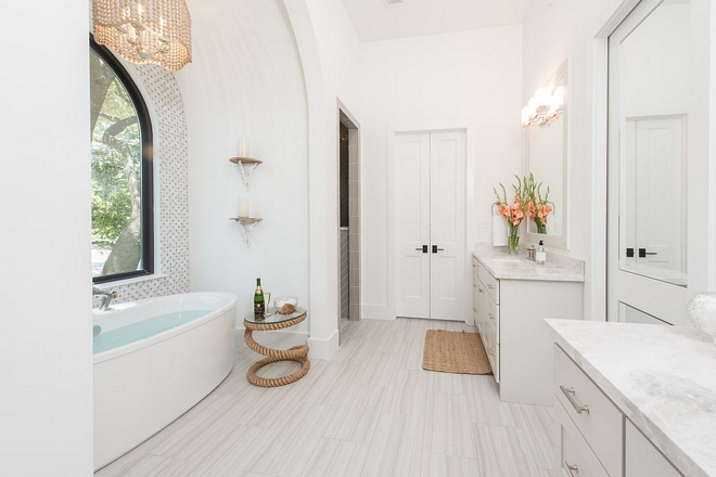 The master bathroom has a very European-chic feel I also like the idea of having the shower tucked away from the main space