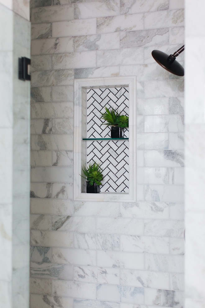 Shower niche A black and white herringbone mosaic tile beautifully accentuates the shower niche Shower niche tile #showerniche #showernichetile #showertile