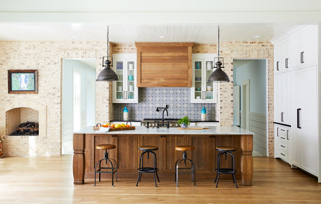 Brick Farmhouse Kitchen The kitchen back wall features hand-cut brick wall with a heavy hand troweled mortar joint Kitchen cabinets are painted Sherwin Williams Alabaster in Flat finish #Brickkitchen #kitchenbrick # FarmhouseKitchen
