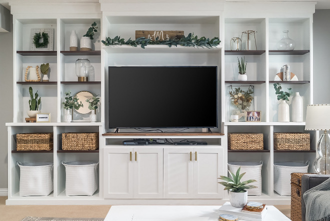 DIY entertainment center DIY Media Bookcase Basement Media TV Bookshelves DIY Bookshelf We decided to build a custom entertainment center that was functional, had storage, and also was a well designed focal point when you walk in the room #DIYentertainmentcenter