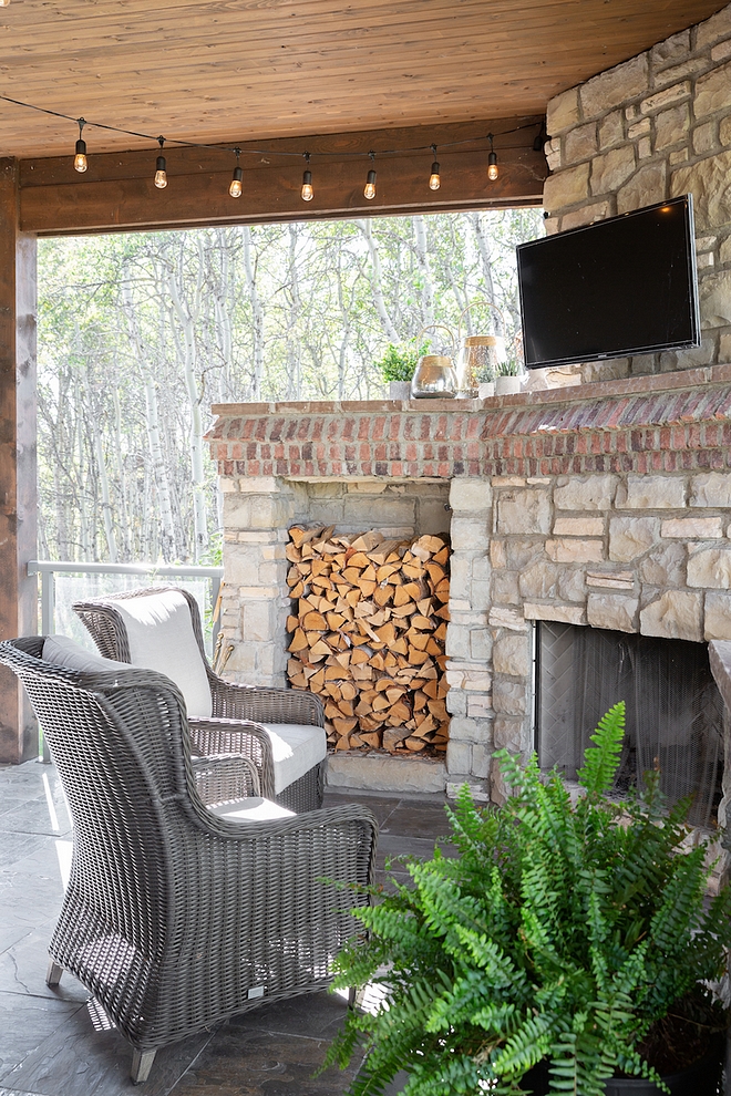 Patio Stone Fireplace with brick accent and Cedar plank ceiling Patio Stone Fireplace #Patio #StoneFireplace