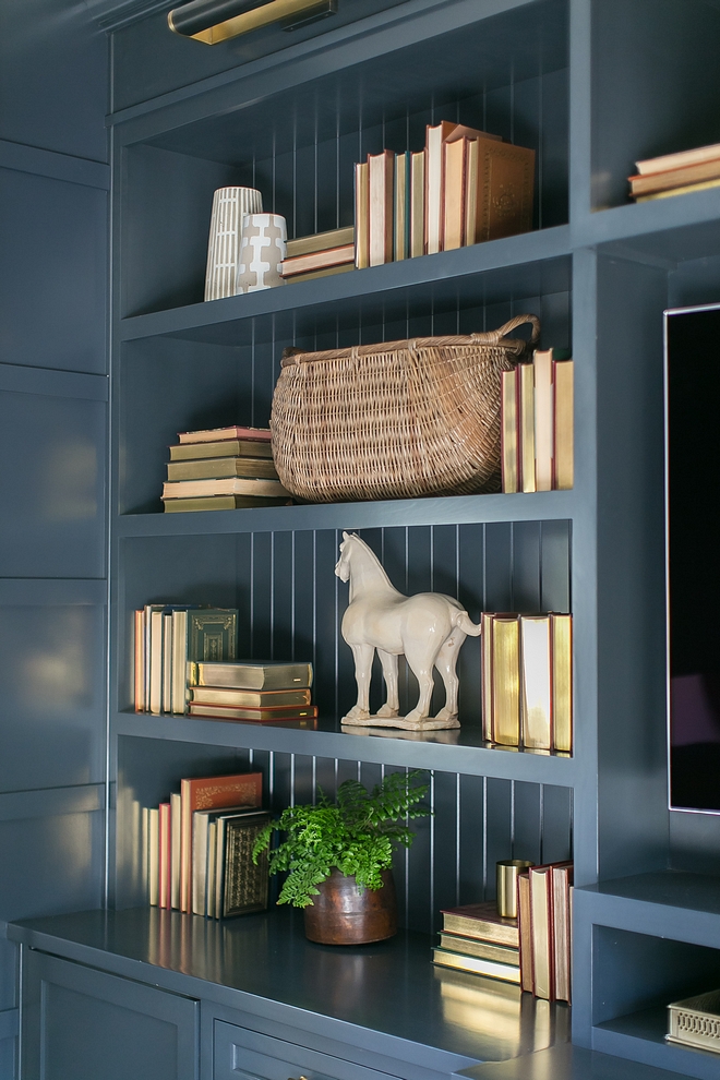 Bookcase decor Books and neutral decor add interest to the custom bookshelves #bookcasedecor
