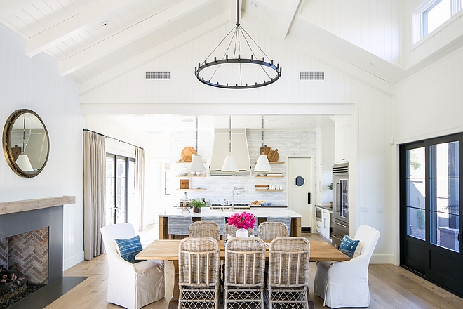 The large farm table divides the kitchen from great room and serves as our casual dining room. I wanted fireplace placed in this space to further define this room