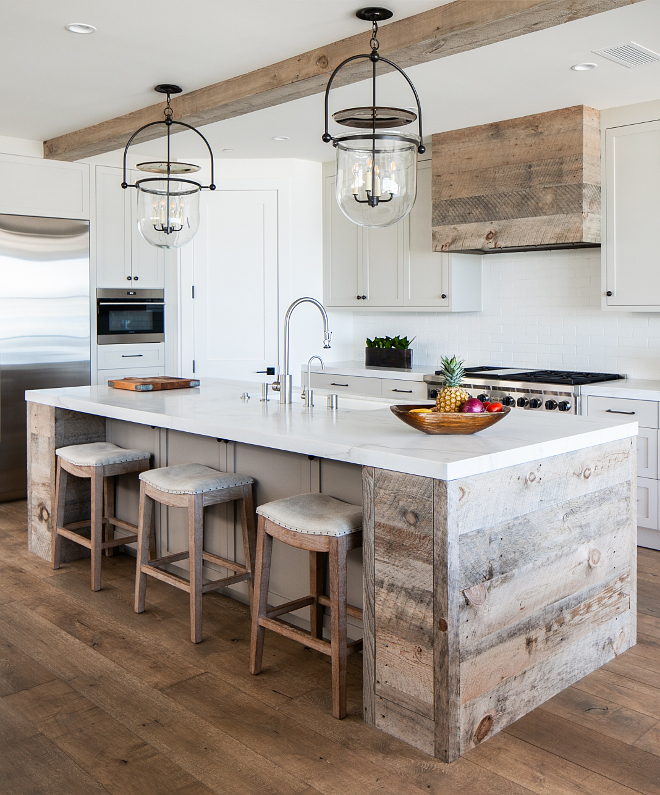 Reclaimed Plank Shiplap kitchen island Reclaimed Plank Shiplap kitchen hood The kitchen combines White Oak vertical grain, paint grade oak and Natural aged reclaimed wood with Shaker-style doors and drawer fronts #ReclaimedPlankShiplap #kitchen #Reclaimedwood #reclaimedshiplap #Plank #Shiplap #kitchenhood