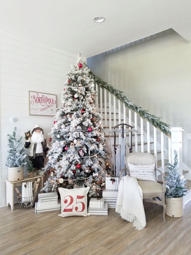 Staircase Christmas Decor Wall paint color is Sherwin-Williams Agreeable Gray