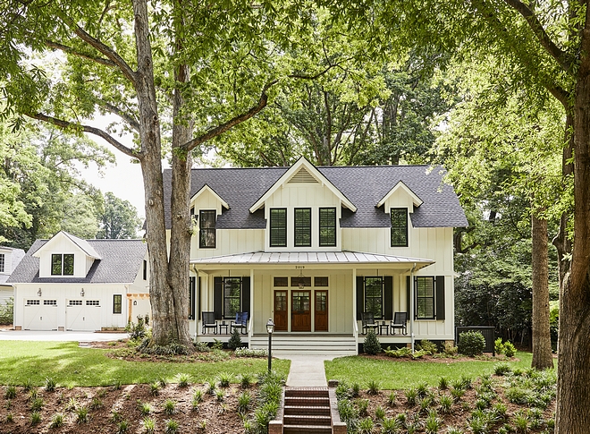 Southern-style Farmhouse Southern-style Farmhouse exterior with board and batten siding metal roof and black windows Southern-style Farmhouse Southern-style Farmhouse Southern-style Farmhouse #SouthernstyleFarmhouse #SouthernFarmhouse