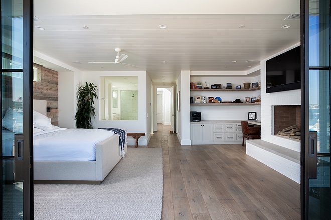 Beach House Upstairs you will find a stunning master bedroom with a dreamy ocean view! Ceiling treatment is paint grade nickel slot siding Beach House #BeachHouse