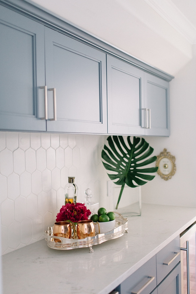 Butler's pantry with blue grey cabinets, Sherwin Williams Storm Cloud, marble-looking countertop and elongated hexagon tile backsplash #SherwinWilliamsStormCloud #blugrey #cabinet #butlerspantry