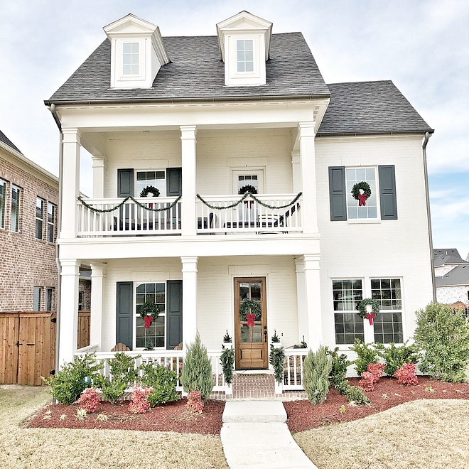 Christmas Exterior Decorating Ideas Classic and simple not excessive Christmas decor Classic Christmas Exterior Decor with wreath and garland Wreath on windows #Christmasexteriordecor #Christmasdecor #Christmas