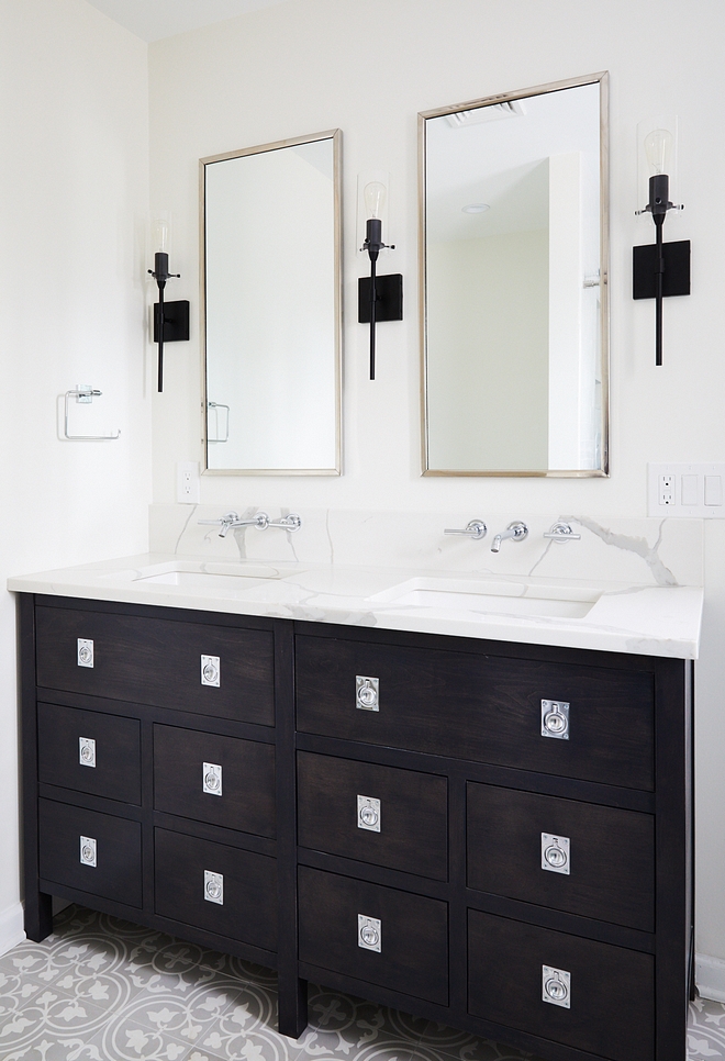 White bathroom with dark stained wood cabinet White bathroom with dark stained wood cabinet ideas Vanity is custom-made and countertop is Quartz, Calacatta #whitebathroom #bathroomcabinet