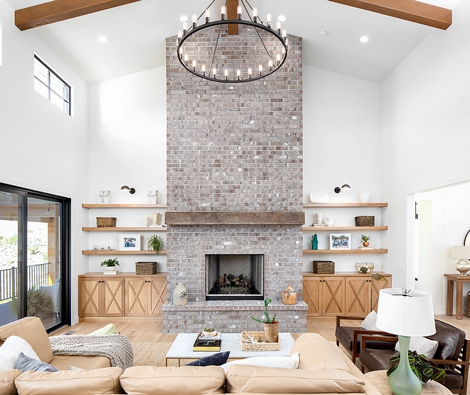 Gray Brick Fireplace Gray Brick Fireplace At first, the designer had planned to paint the fireplace brick white but changed her mind after seeing how much character this gray-ish brick brings to the space #Brickfireplace #Graybrickfireplace