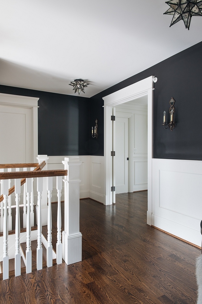 Wainscoting is painted in Benjamin Moore Decorator's White and Walls above waiscoting are painted Benjamin Moore Black #wainscoting #paintcolors #Benjaminmoore #balckandwhite