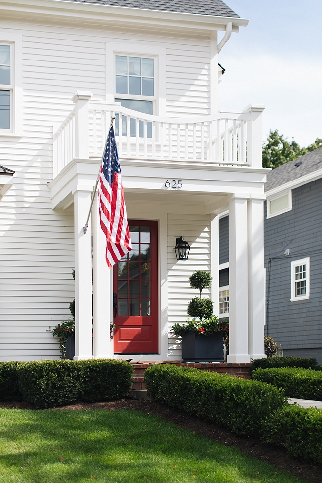 White home siding with red door White siding paint color Benjamin Moore OC17 White Dove Red Door paint color Benjamin Moore Raspberry Truffle #BenjaminMoore #paintocolors #BenjaminMoorepaintcolor #BenjaminMooresiding #BenjaminMoorewhitedove #reddoor