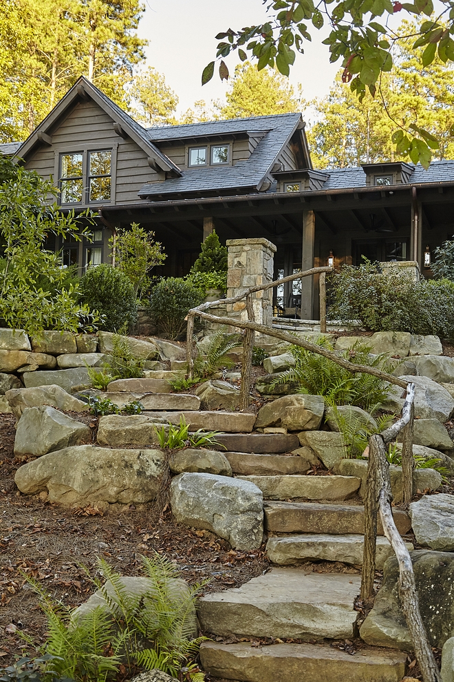 Stone and Pavers Sloping Backyard Stairs I am loving this stone stairway with rustic wood railing Sloping lots Bakcyard stair #stair #backsyard #stonestairs #stonestaircase #woodrailing #rusticrailing #paverstone #paverstaircase