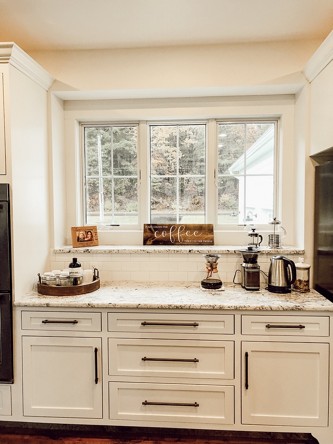 Kitchen Coffee station with White Granite countertop Cabinets are shaker style white custom color match Kitchen Coffee station Kitchen Coffee station #KitchenCoffeestation #Coffeestation #Whitegranite