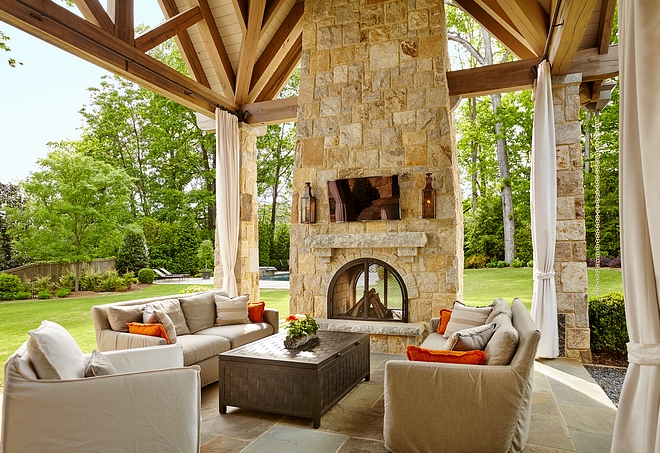 Stone Fireplace Outdoor Stone Fireplace The two-sided outdoor fireplace stone is Weathered Granite The same stone is used on the raised hearth and mantel Stone Fireplace Outdoor Stone Fireplace Stone Fireplace Outdoor Stone Fireplace Stone Fireplace Outdoor Stone Fireplace #StoneFireplace #OutdoorFireplace