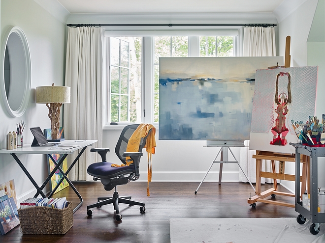 Casement windows bring an abundant amount of natural light to the homeowner's art studio #artstudio