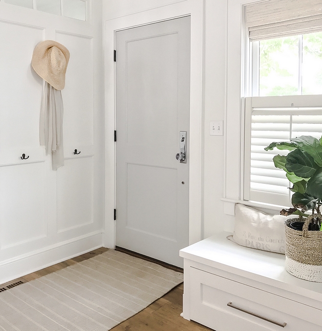 Foyer Mudroom Ideas When winter rolls around, this becomes the hardest working little corner of our house We create a “mudroom” on this wall using board and batten and some simple wall hooks #mudroom #foyer #entry #entryway #boardandbatten