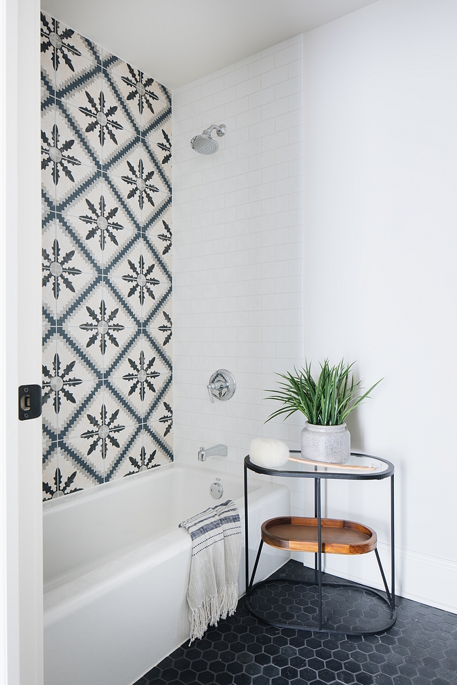 Combining Encaustic cement tile and white subway tile is a great way to add character to any bathroom #bathroom #tile #Encaustictile #cementtile #whitesubwaytile #bathroom