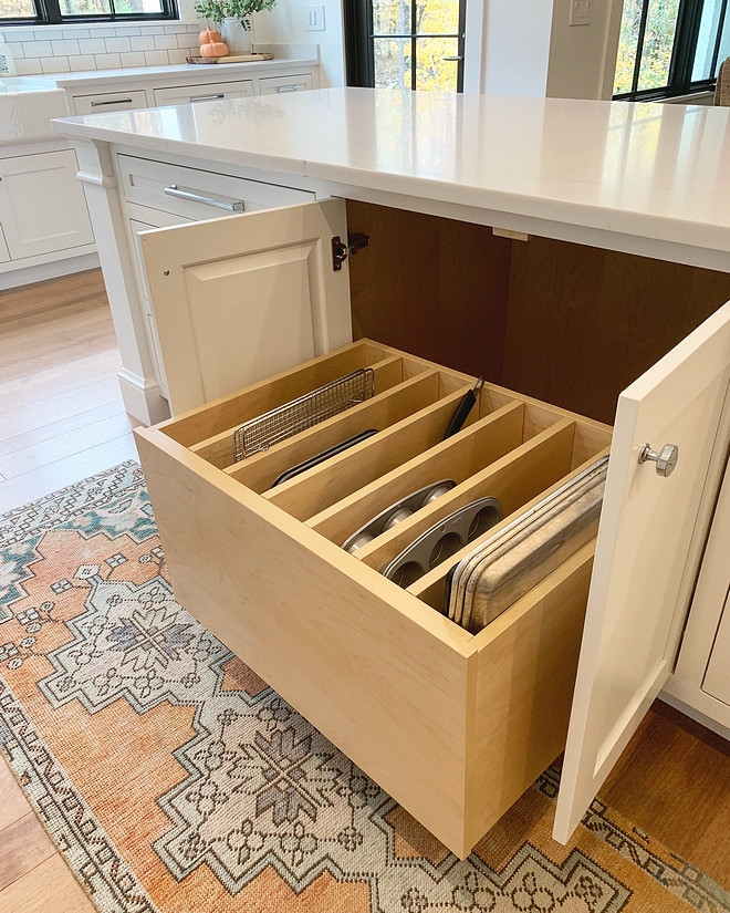Kitchen Sheet Pan Storage This one of the most brilliant ideas I have seen this year: This kitchen features a pull-out sheet pan drawer. This means more space for your sheet pans and cutting boards and everything stays organized