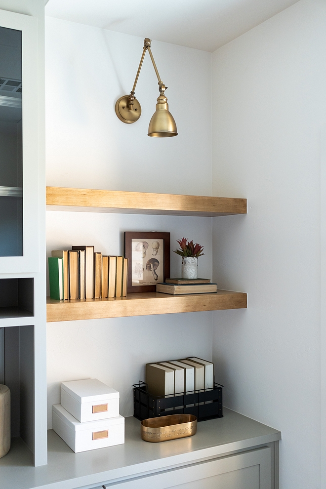 Home Office Floating Shelves Home Office Floating Shelves add an airy feel to this home office Home Office Floating Shelves #HomeOffice #FloatingShelves