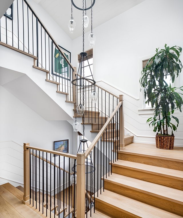 Horizontal shiplap wainscoting The staircase features White Oak treads, White Oak posts and railing with metal spindles. Walls are horizontal shiplap wainscoting #horizontalshiplap #shiplapwainscoting #staircase #staircaseshiplap #staircasewainscoting