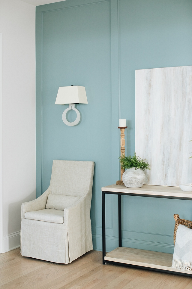 Alabaster Sconce Alabaster Sconce on paneled wall painted in a Benjamin Moore aqua blue color #AlabasterSconce #Alabaster #Sconce #paneledwall #BenjaminMoore #aquapaintcolor #bluecolor