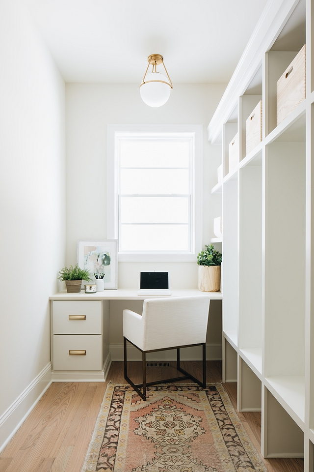 Mudroom The mudroom convinently features a custom built-in desk and plenty of cubbies Mudroom ideas Mudroom layout Mudroom Runner Mudroom Lighting Mudroom Cubbies Mudroom Desk #Mudroom #cubbies #Mudroomideas #Mudroomlayout #MudroomRunner #MudroomLighting #MudroomCubbies #MudroomDesk