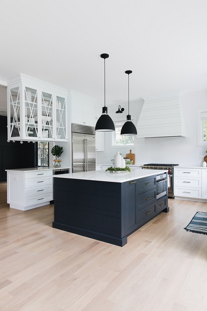 Black and white kitchen white kitchen with black island Nothing feels more "modern farmhouse" than black and white and this combo also works well on kitchens Black and white kitchen paint color Color scheme Color palette Paint Colors #modernfarmhouse #farmhousekitchen #modernfarmhousekitchen #blackandwhite
