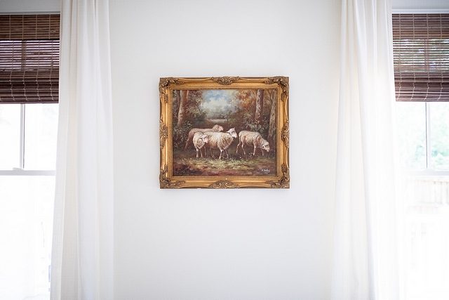 The design inspiration for our bedroom is centered around this antique oil painting of sheep