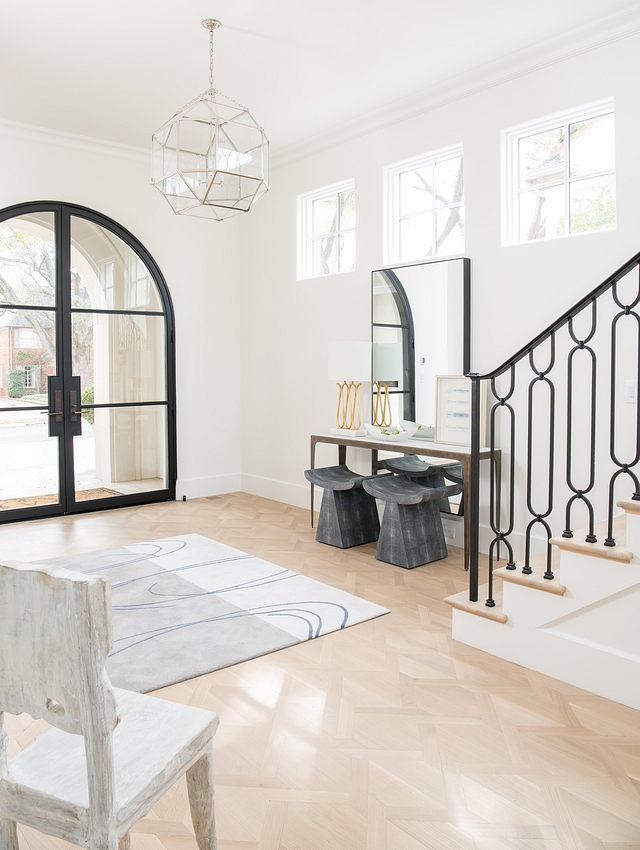 Benjamin Moore White Dove with very light White Oak hardwood flooring and arched black metal and glass front door Benjamin Moore White Dove #BenjaminMooreWhiteDove #BenjaminMoore