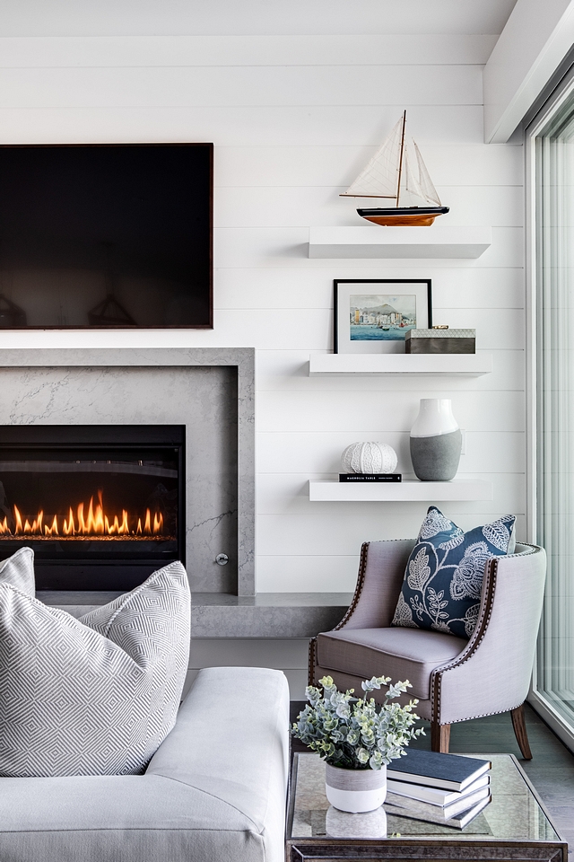 Chunky floating shelves The fireplace is flanked by a pair of framed artwork and chunky white floating shelves Chunky floating shelves Chunky floating shelves #Chunkyfloatingshelves #floatingshelves