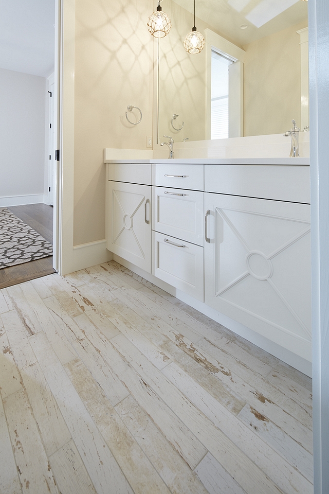Benjamin Moore Decorators White bathroom vanity with Recessed doors #BenjaminMooreDecoratorsWhit