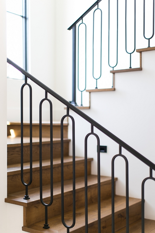 The staircase features custom-designed metal railing and White Oak threads #staircase #interiors #interiordesign #homedecor #homes #metalrailing #WhiteOakthreads