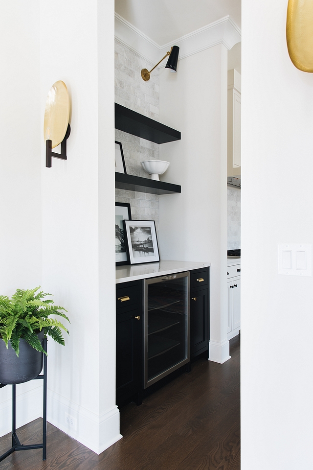 Black Butlers Pantry The butler's pantry features black cabinetry and black floating shelves, painted in Benjamin Moore Black #BenjaminMooreBlack #blackbutlerspantry #blackshelves #blackfloatingshelves