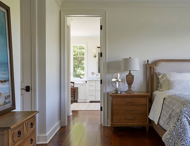 The master bedroom and bathroom features the same wide plank pine flooring #bedroom #bathroom #hardwoodflooring