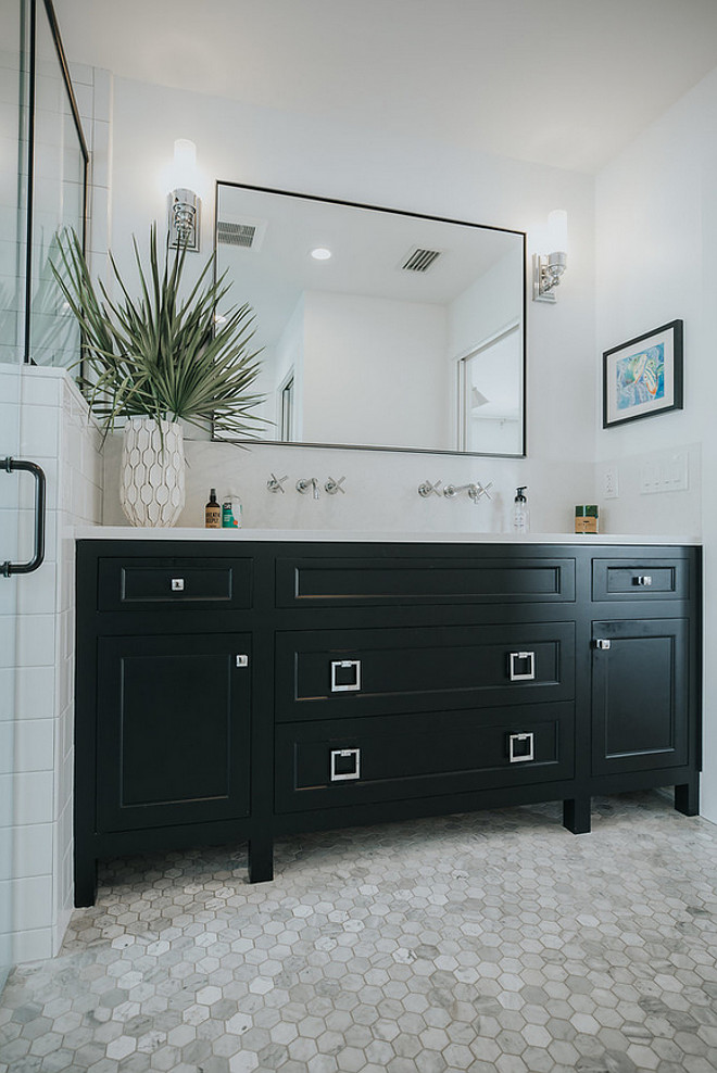 Black bathroom vanity paint color Bathroom also features a custom vanity by Crystal Cabinet Works in a Black Matte Finish. Countertop is Caesarstone Calacatta Nuvo Black bathroom vanity Black bathroom vanity Black bathroom vanity #Blackbathroomvanity