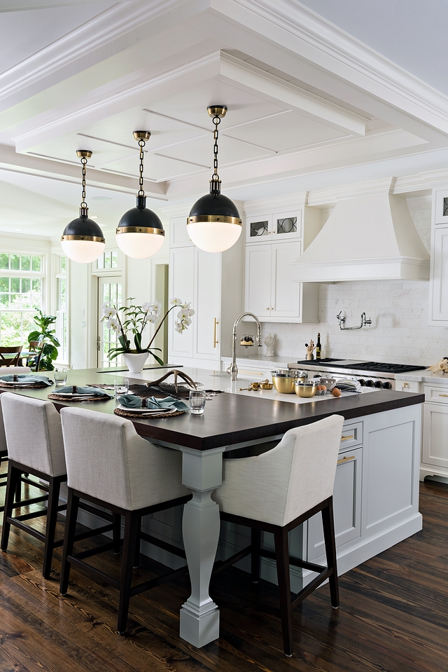 Kitchen island wood countertop The kitchen island features a wood eating counter and custom posts Kitchen island wood countertop and marble #Kitchenisland #woodcountertop #counter #countertop