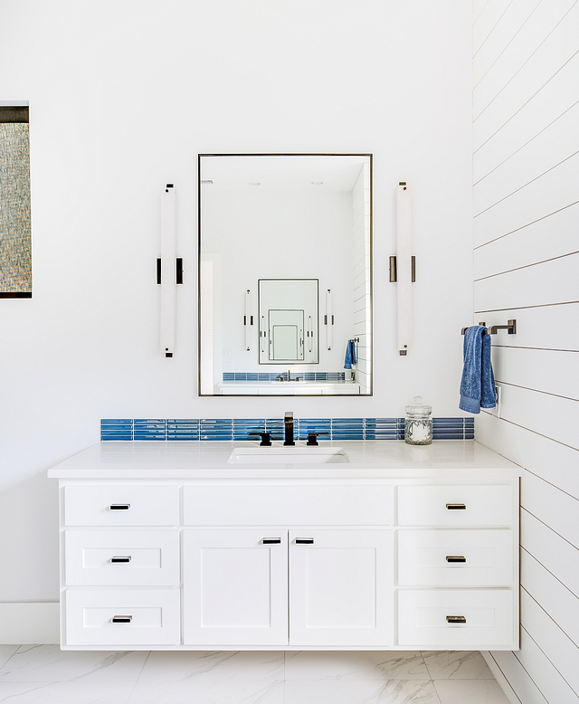 Modern Farmhouse Bathroom Featuring custom floating vanities facing each other, this master bathroom has a fresh design and many inspiring design ideas #bathroom #modernfarmhousebathroom