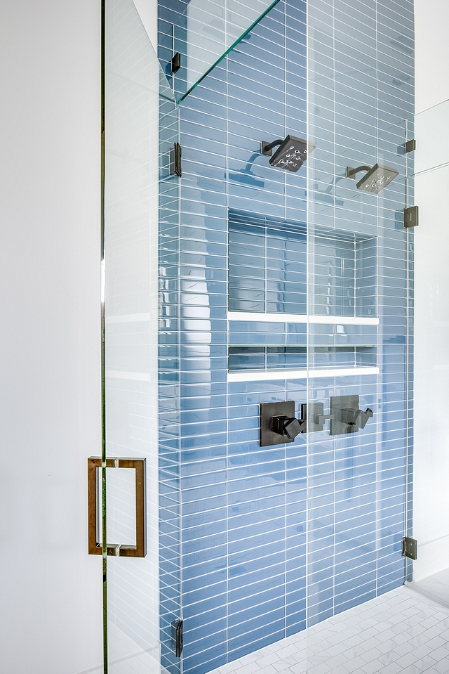 Shower with blue and white tile Blue glass tile #shower #bluglasstile #showertile