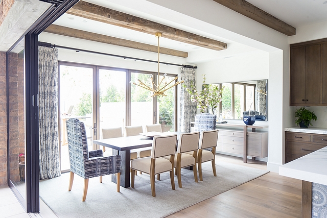 Dining Room with an outdoor feeling The dining room was divided to create a larger outdoor area and it now features a pair of retractable patio doors #Diningroom #outdoor #indoor #retractablepatiodoor