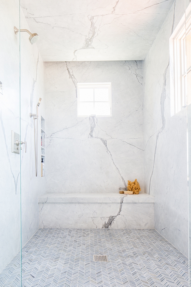 Shower Slab Wall Shower Marble Slab Wall The large walk-in shower features thin marble herringbone floor tiles and stunning Statuario marble slab walls Shower Slab Wall Shower Marble Slab Wall #ShowerSlab #WallShower #MarbleSlabWall #showerMarbleSlabWall #MarbleSlab