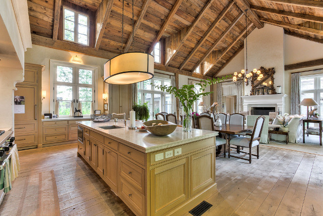 French Country Home Interiors. French Country Home Interior Ideas. The kitchen opens to a stunning great room. I am loving the plank hardwood floors and the reclaimed barn wood ceiling. French Country Home Interior Design. French Country Home Interior Pictures. French Country Home Interiors. #FrenchCountry #Home #Interiors. Sotheby's Canada.