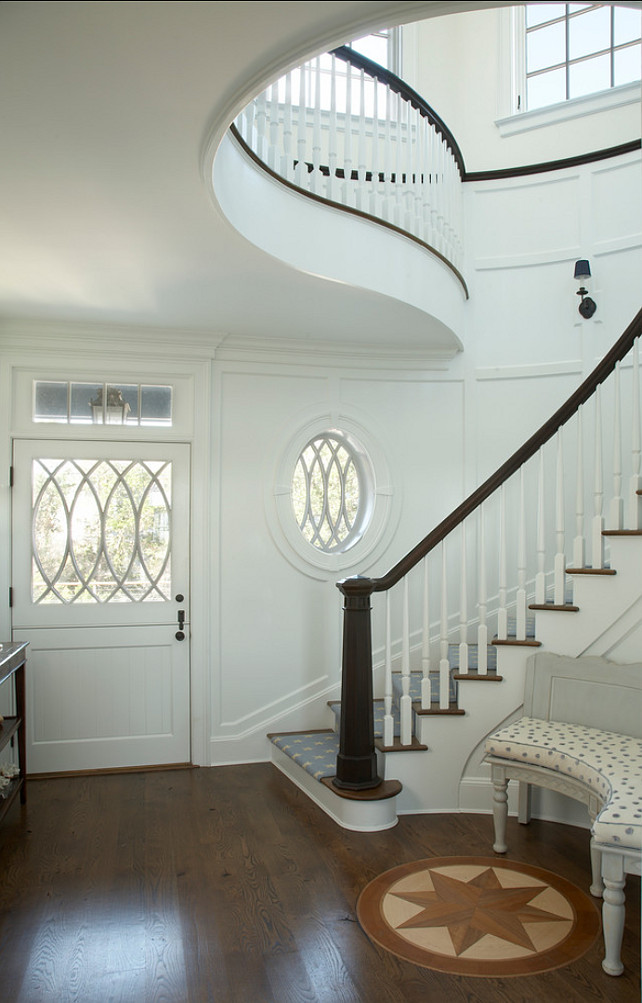 Entryway. Coastal Inspired Entryway with stunning staircase details. #Entryway