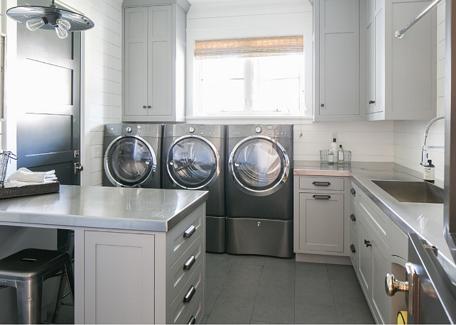 Laundry room. Industrial style laundry room with gray cabinets and muiltiple machines. #LaundryRoom #GrayCabinet #PaintColor #LaundryRoomIdeas #LaundryRoomCabinet #Industrial #DoubleMachineLaundryRoom Brooke Wagner Design.