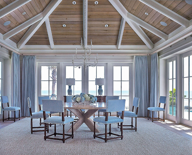 Dining Room. Coastal Dining room. Dining room with blue and white decor, blue curtains, blue dining chairs, round table, vaulted ceiling. #DiningRoom #Coastal Cronk Duch Architecture.