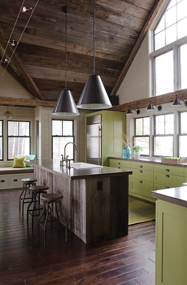 Rustic kitchen with plank wood island. Rustic kitchen with green cabinets, reclaimed wood ceiling, plank wood island with Soapstone countertop. #Kitchen #Rustic #Reclaimed #Plank #PlankWoodIsland #PlankIsland OLSON LEWIS + Architects.