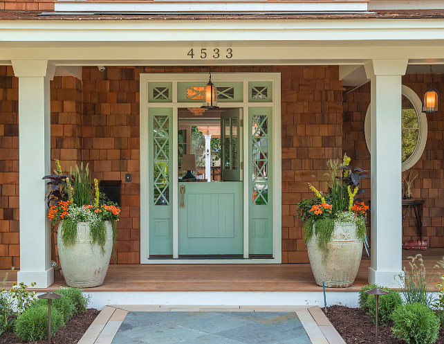 Front Entry. Front Entry and Front Door Ideas. Front Entry with Dutch Doors painted in Wythe Blue by Benjamin Moore. Front entry door paint color and planters. #FrontEntry #FrontDoor #PaintColor #Planters #BenjaminMooreWytheBlue Great Neighborhood Homes.